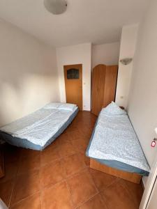 Postel nebo postele na pokoji v ubytování Pensjonat Lemon
