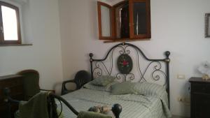 Postel nebo postele na pokoji v ubytování Agriturismo Cordiglianello