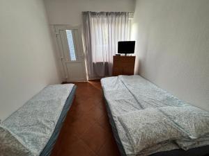 Postel nebo postele na pokoji v ubytování Pensjonat Lemon
