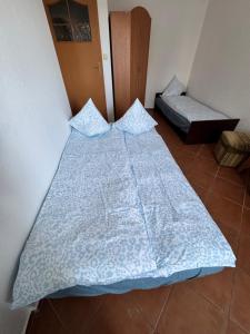 Postel nebo postele na pokoji v ubytování Pensjonat Lemon