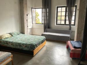 Postel nebo postele na pokoji v ubytování Stylish Art House Palmeti