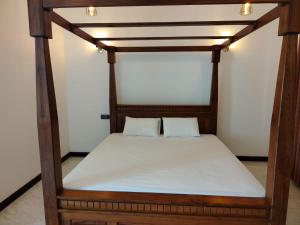 Postel nebo postele na pokoji v ubytování Diora Hotel