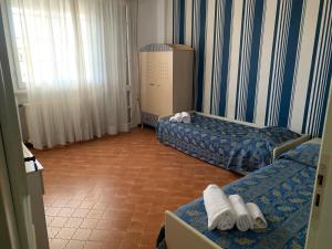 Postel nebo postele na pokoji v ubytování Hotel Panoramic