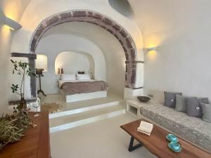 Cama o camas de una habitación en Elysian Santorini