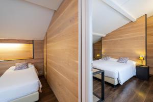 Postel nebo postele na pokoji v ubytování Hotel Italia