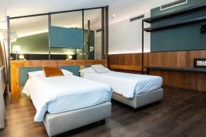 Postel nebo postele na pokoji v ubytování Hotel Italia