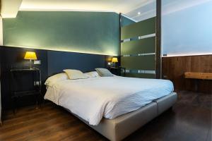 Postel nebo postele na pokoji v ubytování Hotel Italia