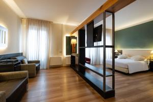 Postel nebo postele na pokoji v ubytování Hotel Italia