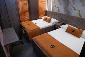 Postel nebo postele na pokoji v ubytování Hotel Bacatá Isla