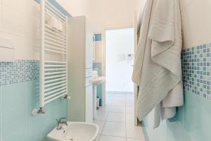 a bathroom with a toilet and a sink at il terrazzino di Marco e Francesca in Siena