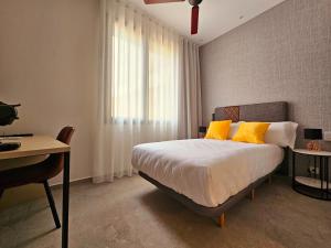 Postel nebo postele na pokoji v ubytování Cousin Room Hotel Automatizado