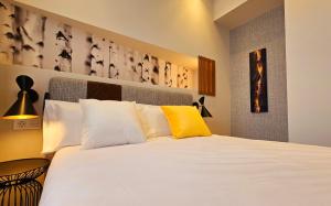 Postel nebo postele na pokoji v ubytování Cousin Room Hotel Automatizado