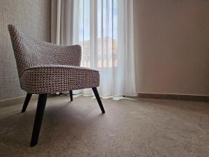 Posezení v ubytování Cousin Room Hotel Automatizado