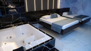 Postel nebo postele na pokoji v ubytování Hotel Bacatá Isla