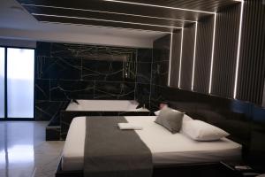 Postel nebo postele na pokoji v ubytování Hotel Bacatá Isla