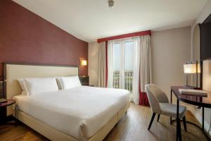 Postel nebo postele na pokoji v ubytování Hotel St Martin by OMNIA hotels