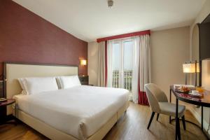 Postel nebo postele na pokoji v ubytování Hotel St Martin by OMNIA hotels