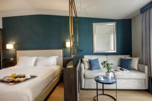 Postel nebo postele na pokoji v ubytování Hotel St Martin by OMNIA hotels