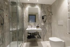 Koupelna v ubytování Hotel St Martin by OMNIA hotels