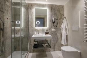Koupelna v ubytování Hotel St Martin by OMNIA hotels