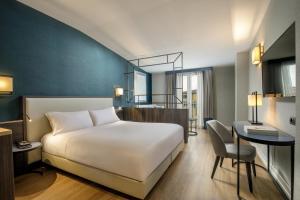 Postel nebo postele na pokoji v ubytování Hotel St Martin by OMNIA hotels