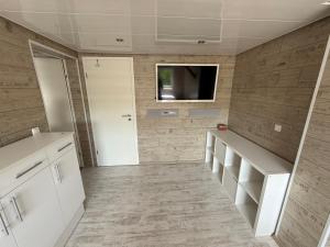 TV a/nebo společenská místnost v ubytování Ferienwohnung Rupperbergblick