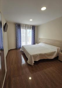 Ένα ή περισσότερα κρεβάτια σε δωμάτιο στο Ancla Spaces nuevo apt cerca del mar, sin vistas