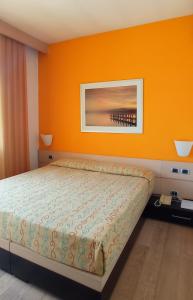 Postel nebo postele na pokoji v ubytování Hotel I Cedri