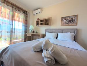 Katil atau katil-katil dalam bilik di Spiranca Cityview Residence