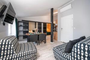 Kuchyňa alebo kuchynka v ubytovaní Kościelna Loft Apartaments