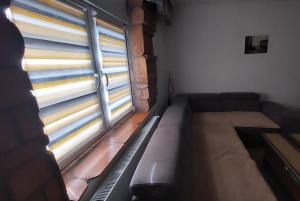 Khu vực ghế ngồi tại Apartmani Bogatić 3