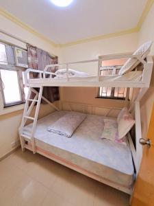 Voodi või voodid majutusasutuse Entire 3BR king size bed Apt gd for Family tour toas