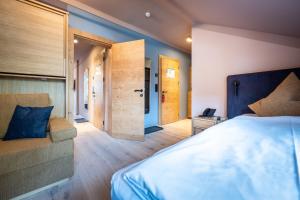 Postel nebo postele na pokoji v ubytování Hotel Zum Mohren