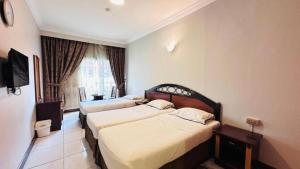 Postel nebo postele na pokoji v ubytování Dancenter San Marino Hotel