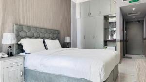 Postel nebo postele na pokoji v ubytování Dancenter San Marino Hotel
