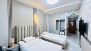 TV a/nebo společenská místnost v ubytování Dancenter San Marino Hotel