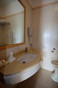 Koupelna v ubytování Hotel Man