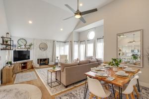 a living room with a couch and a table at 1 Mi to Coast Family-Friendly Gem in Solana Beach in Solana Beach
