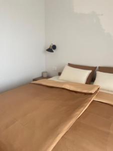 Postel nebo postele na pokoji v ubytování Apartments Wally
