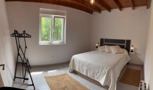 Ένα ή περισσότερα κρεβάτια σε δωμάτιο στο Casa La Raíz Cántabra +7 φωτογραφίες