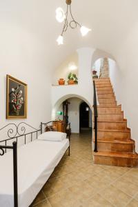 Postel nebo postele na pokoji v ubytování Traditional 3BR Family Home in Pyrgi Village