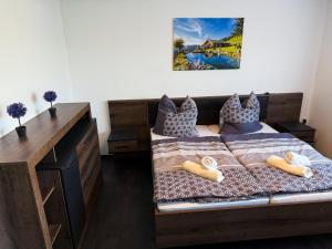 Ένα ή περισσότερα κρεβάτια σε δωμάτιο στο Villa Wolke - Ferienwohnung