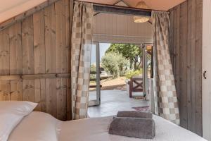 Postel nebo postele na pokoji v ubytování Be Vedetta - Relais & Glamping - Adult Only + 37 fotografií