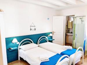 Postel nebo postele na pokoji v ubytování B&B Casa De Mare