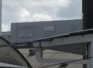 a sign on the top of a building at exclusiva - COP 30 in Belém