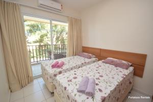 Postel nebo postele na pokoji v ubytování Beach Living Apartment + 102 fotografií