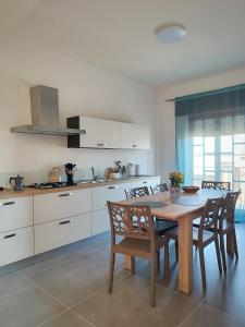 Η κουζίνα ή μικρή κουζίνα στο Cà Porto-Rooms with Balcony&Terrace