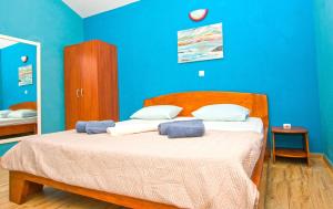 Posteľ alebo postele v izbe v ubytovaní Apartment Porat