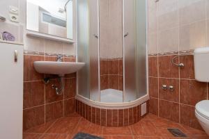 Koupelna v ubytování Apartments JoviZe + 37 fotografií