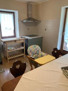 Ένα ή περισσότερα κρεβάτια σε δωμάτιο στο Cozy house and Dolomites view